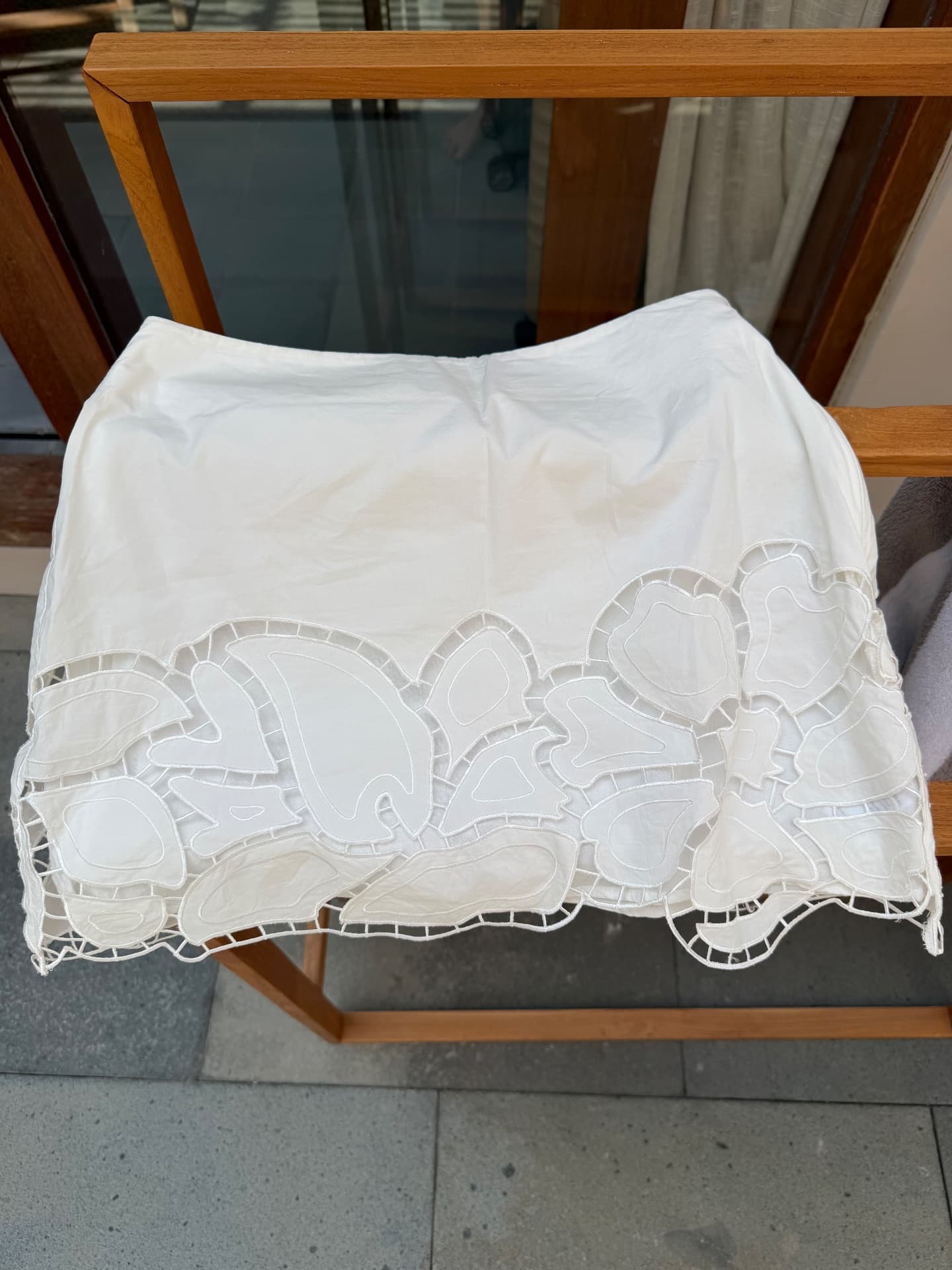 MAGALI PASCAL MINI SKIRT - WHITE WITH LASER CUT DETAIL (1/2)