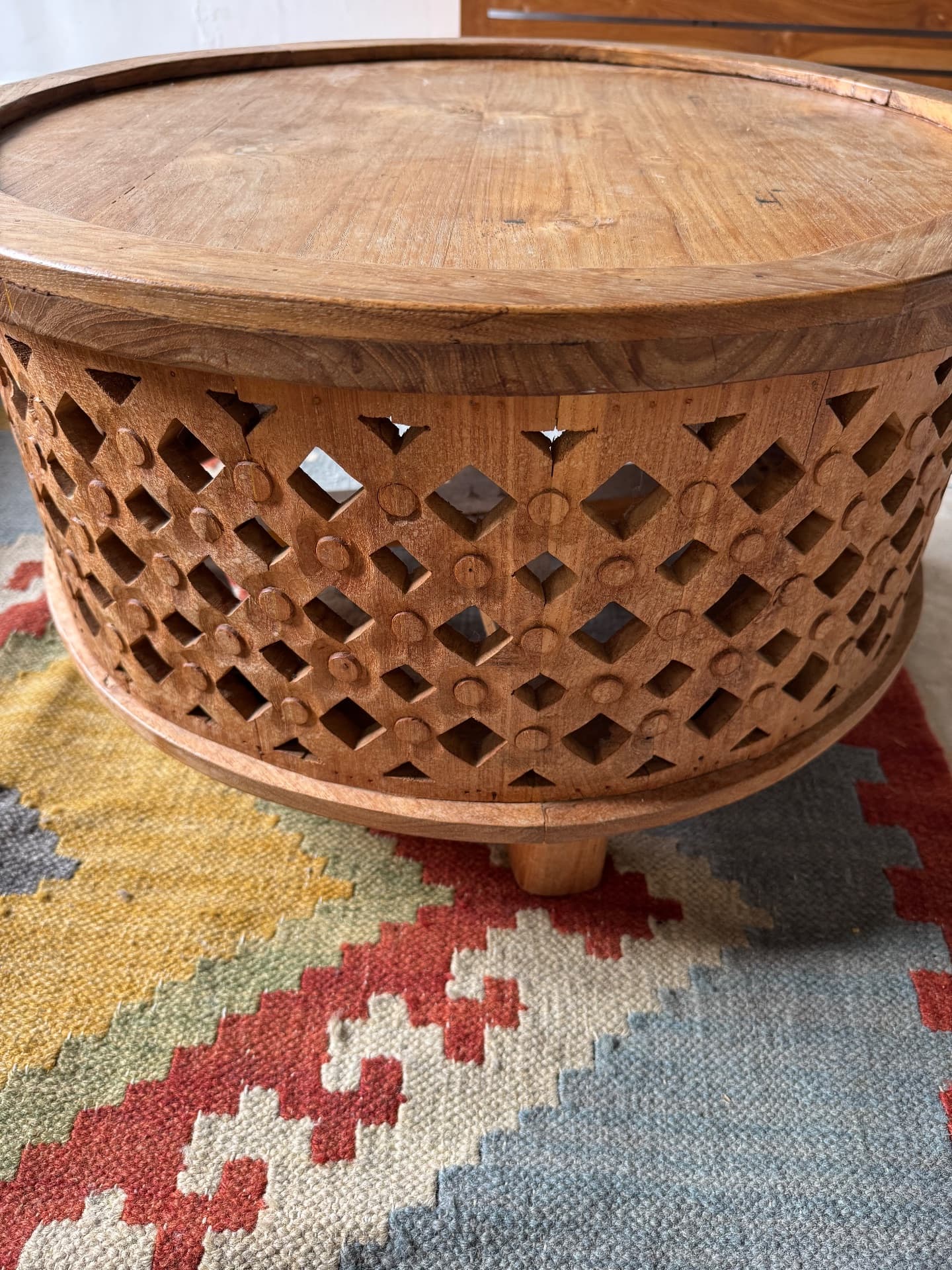 Carved wooden round table (1/2)