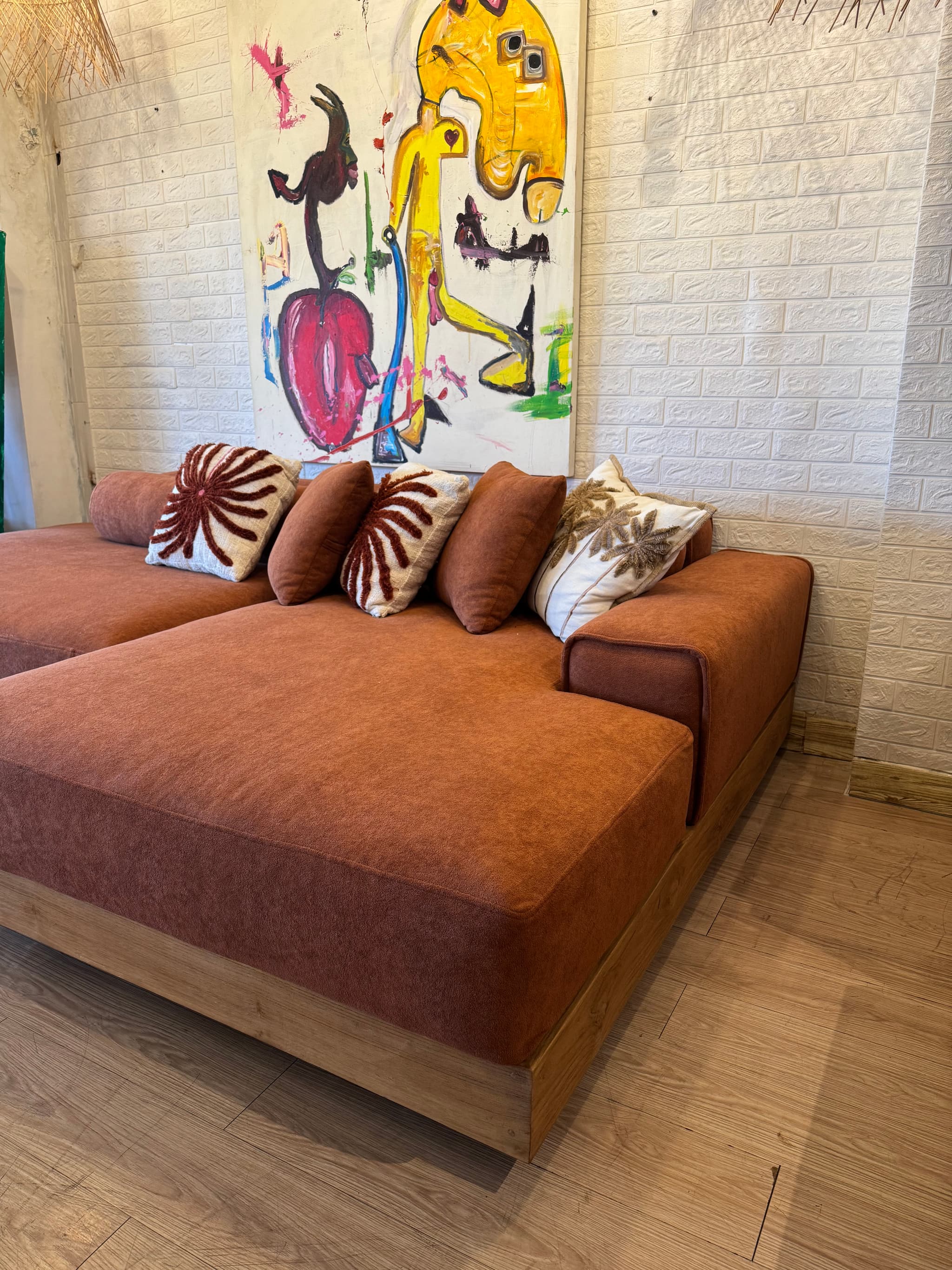 L-shaped brown sofa — photo 1